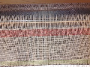 Close up of the pattern on the loom. 